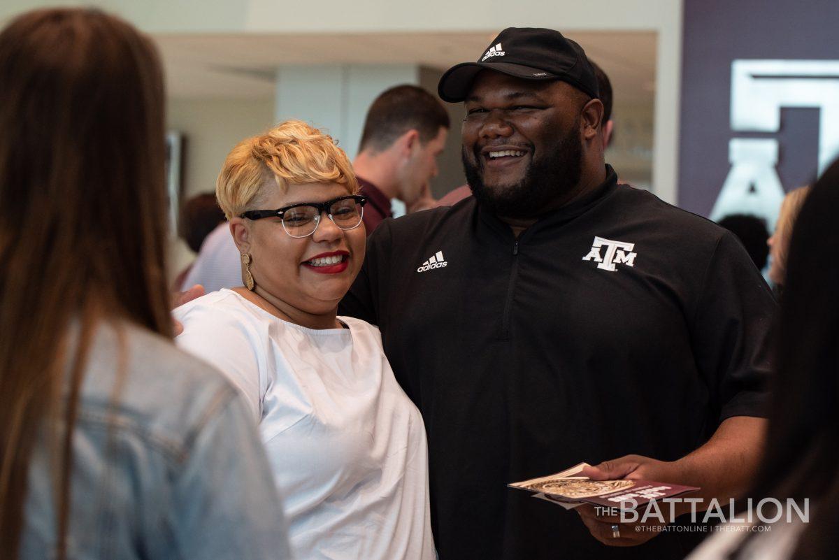 Sport management graduate student Larry McDonalds wife, Tasmine, surprised him with his Aggie Ring at the ceremony.