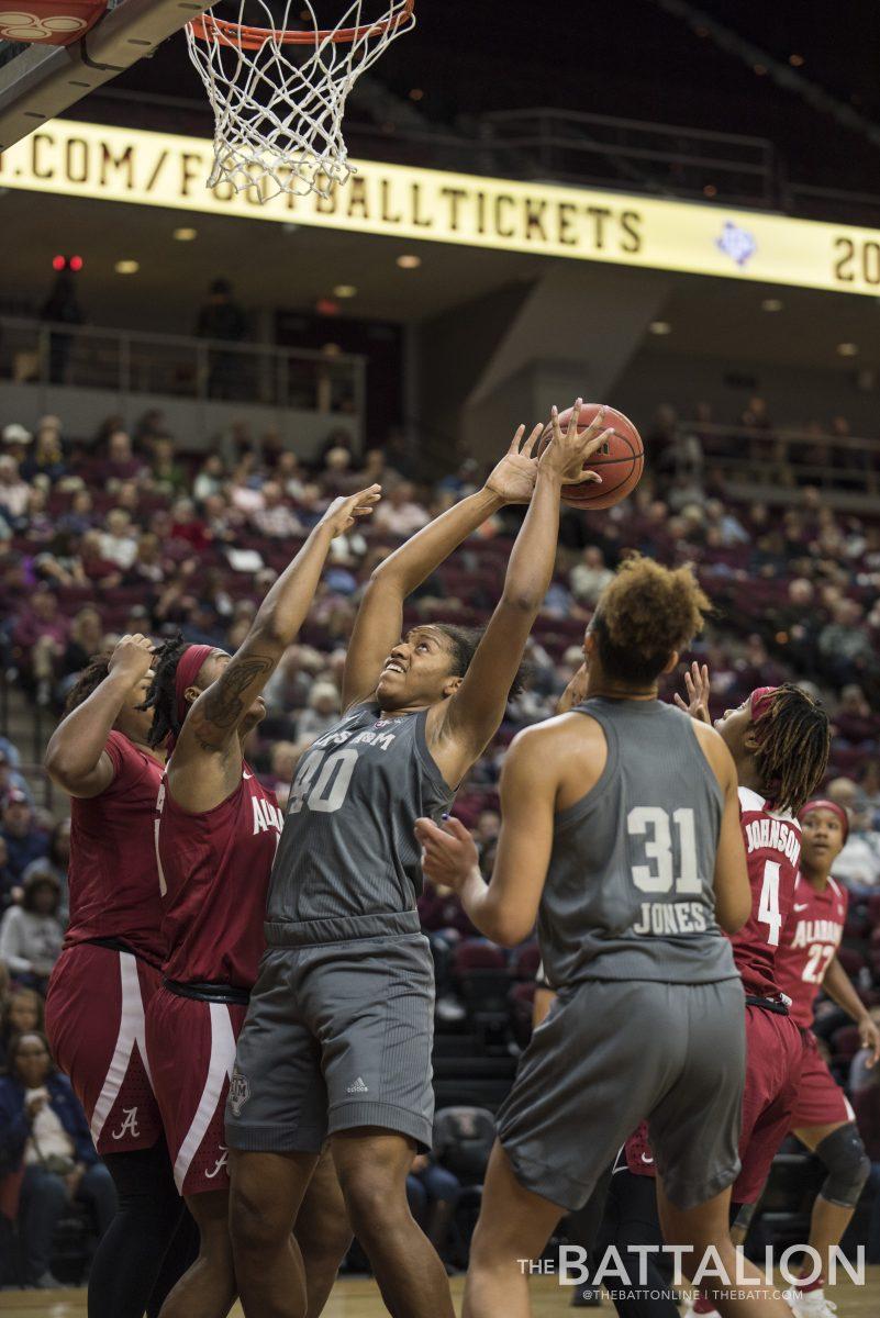 Sophomore center Ciera Johnson scored 18 points and made 11 rebounds, leading the Aggies to a victory over Alabama on Sunday.
