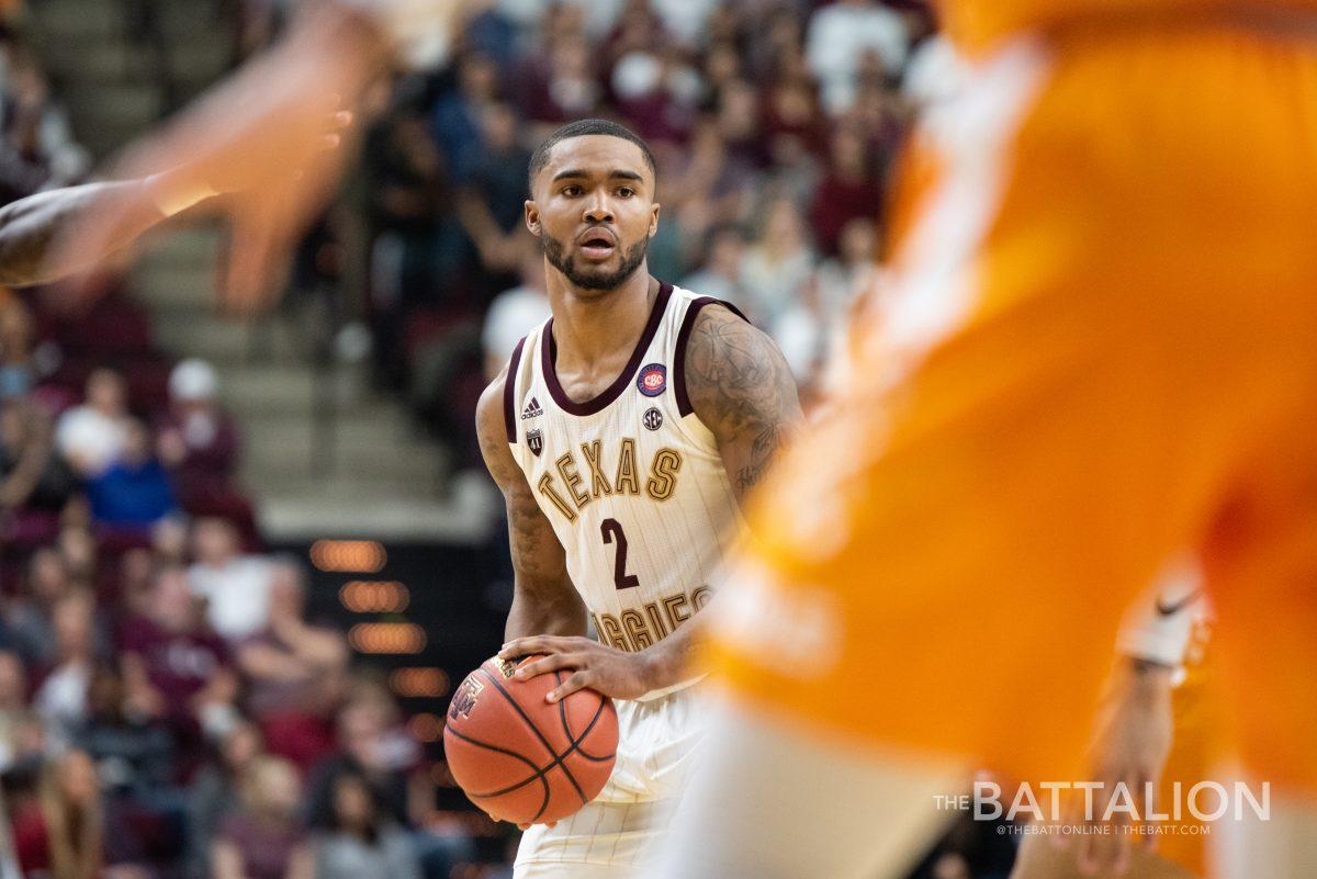 Sophomore guard TJ Starks looks for a teammate to pass the ball to.