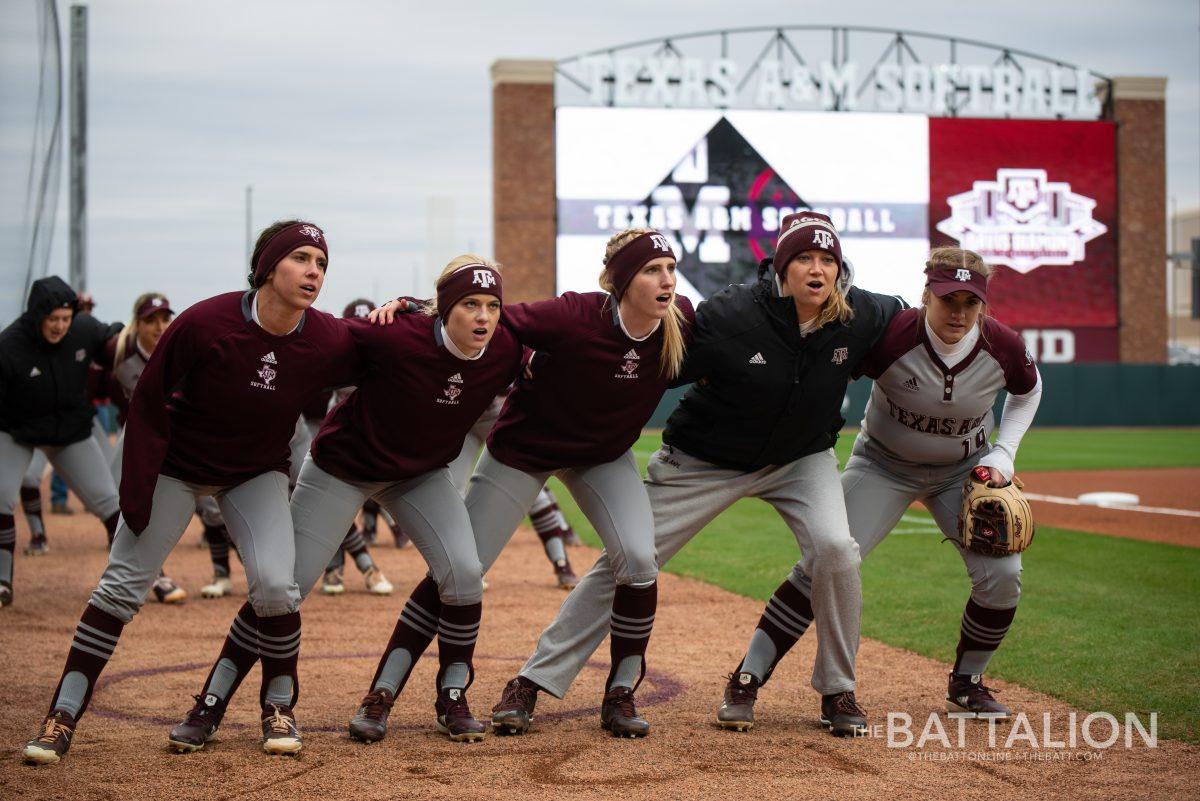 The A&M softball team sways during the War Hymn.