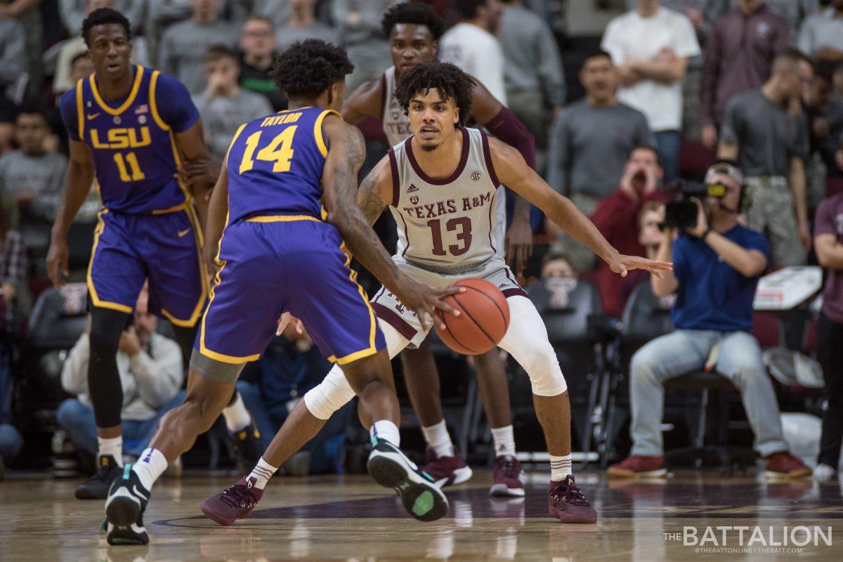 Sophomore&#160;Brandon Mahan&#160;blocks LSU player Marlon Taylor from passing the ball.