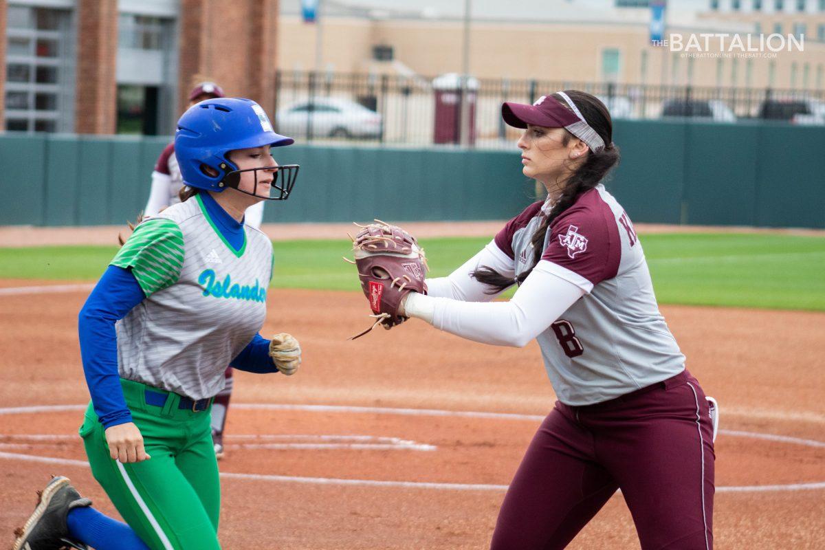 Freshman Baylee Klingler tagged out a runner for the final out of the inning.