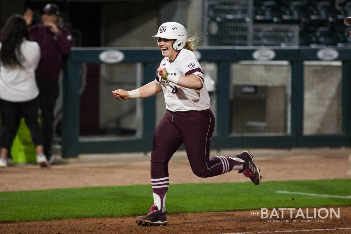 Junior+Kelly+Martinez+celebrates+after+getting+the+game+winning+hit+to+end+the+Aggies%26%238217%3B+15-inning+game+against+SFA.