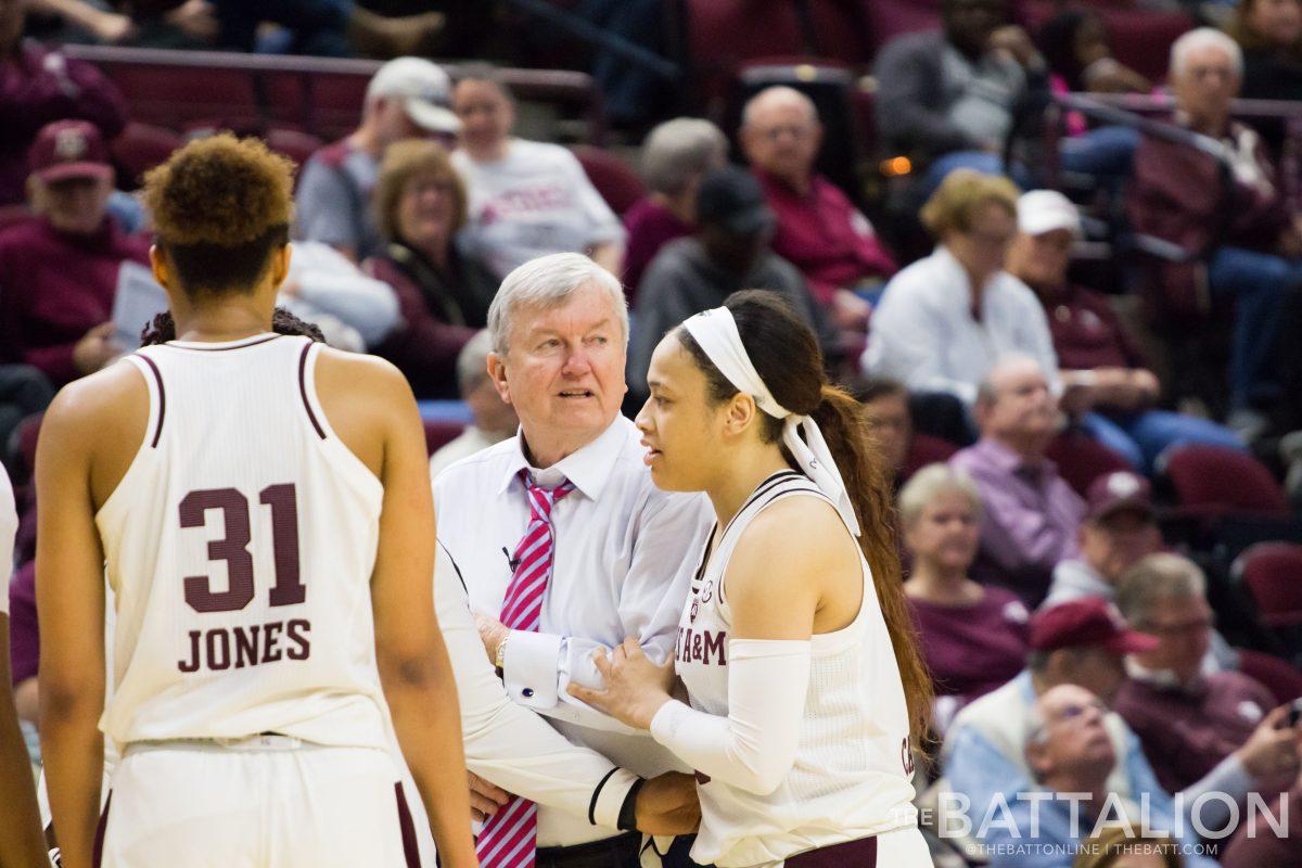 Sophomore guard Chennedy Carter&#160;comforts head coach Gary Blair after a team foul.&#160;