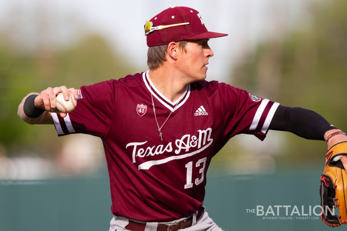Senior Chandler Morris warms up before the game against the University of Texas on April 2 at Disch-Falk Field in Austin.