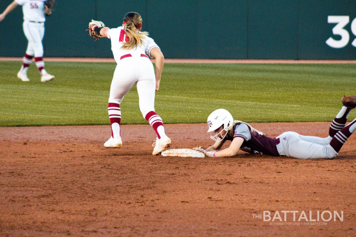 Junior Blake-Ann Fritsch gets thrown out at second base after a dropped pop up to the outfield.