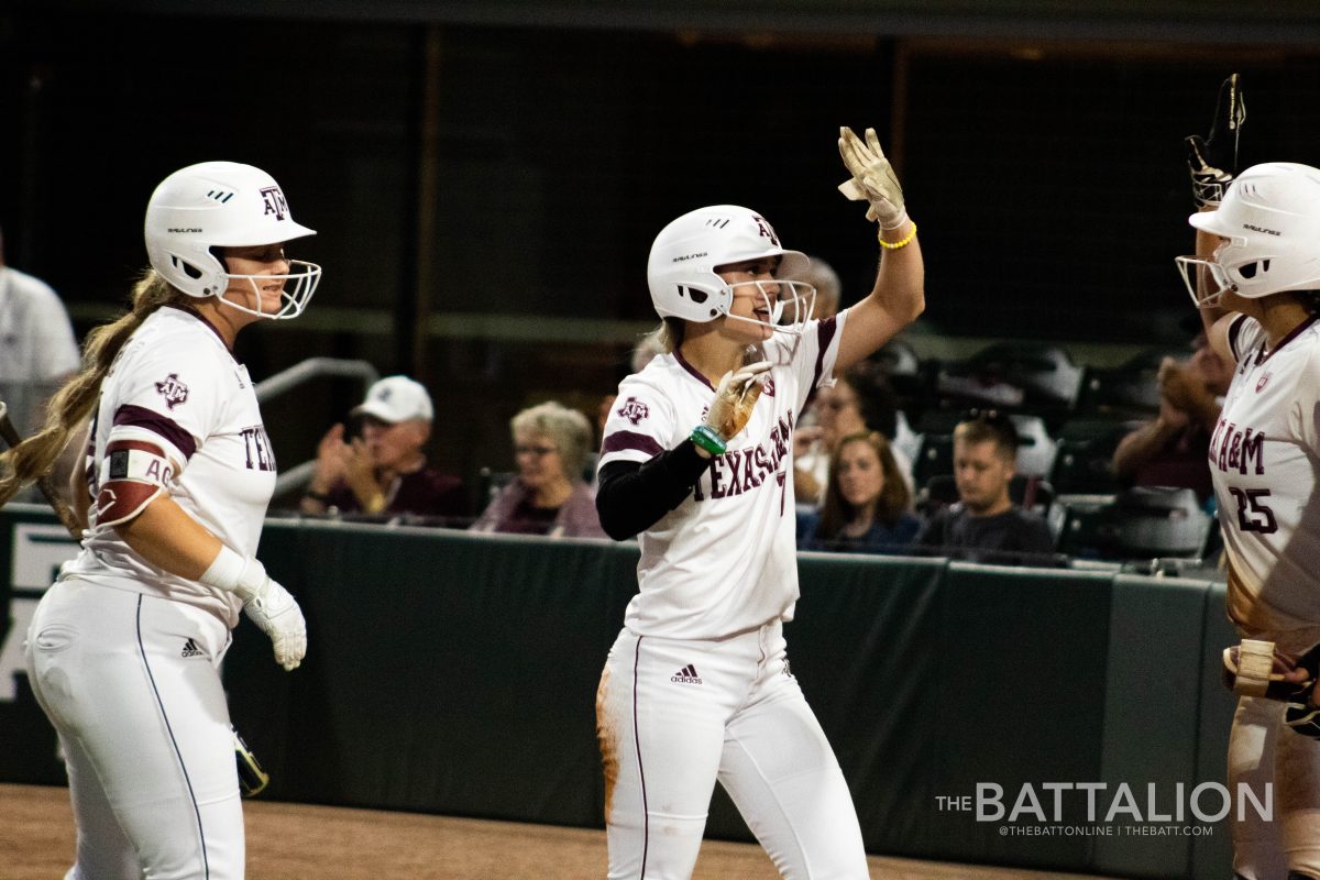 Junior&#160;Kelbi Fortneberry celebrates after scoring on a pass ball.