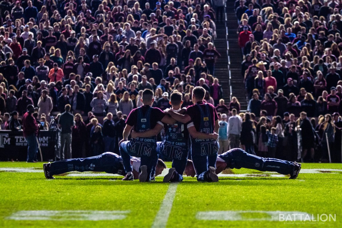 2018 Senior Yell Leaders Conner Joseph, Gavin Suel and Blake Jones look out to crowd as they get ready to begin their last Midnight Yell as Yell Leaders.