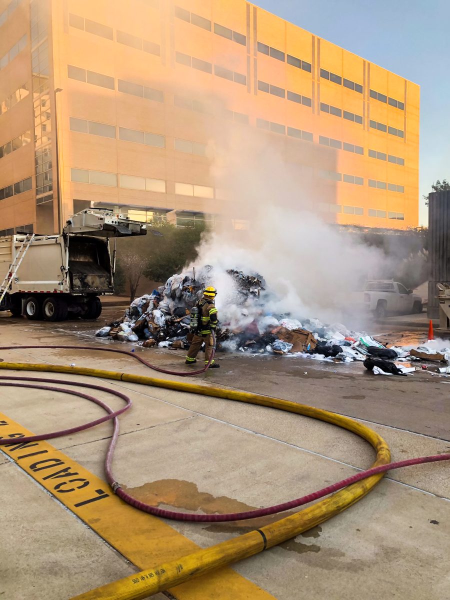 At 7:30 a.m., the College Station Fire Department responded to a fire involving a garbage truck in a parking lot near the Blocker building.