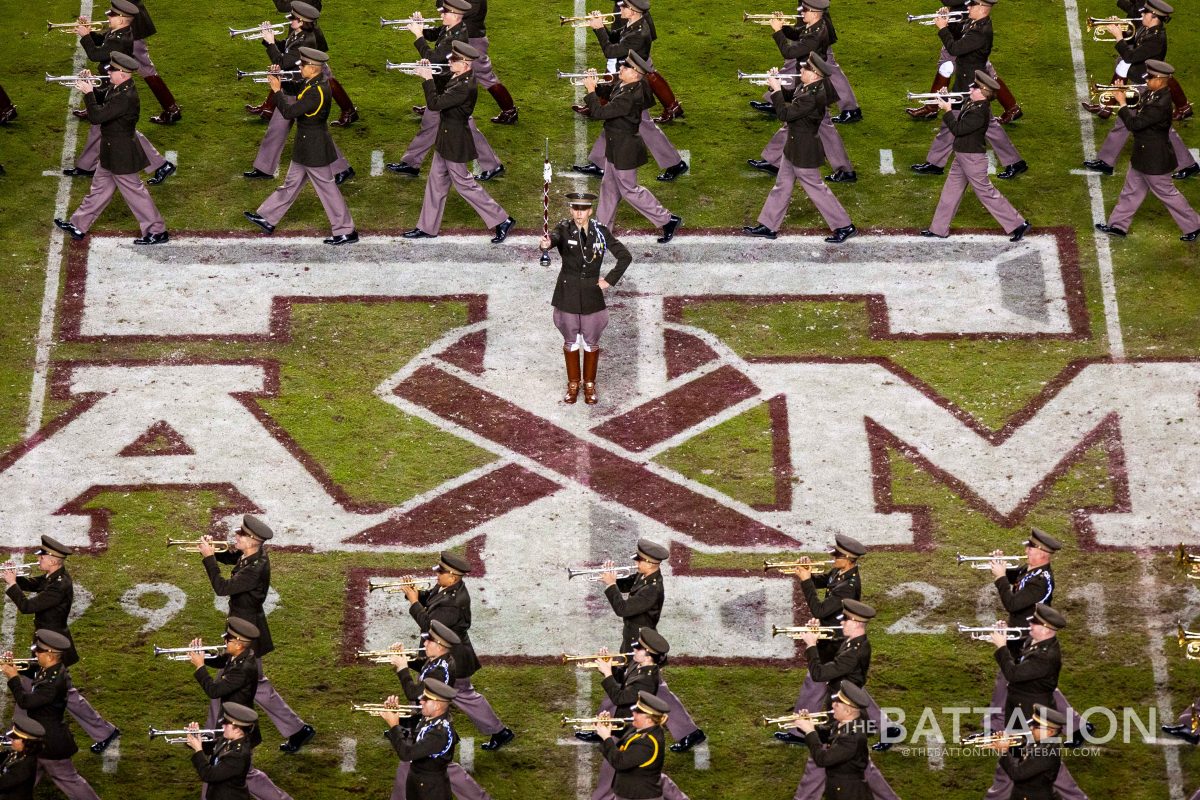 The Fightin’ Texas Aggie Band completes its last halftime drill in Kyle Field for this season, led by Combined Band Drum Major Micheal Milton.