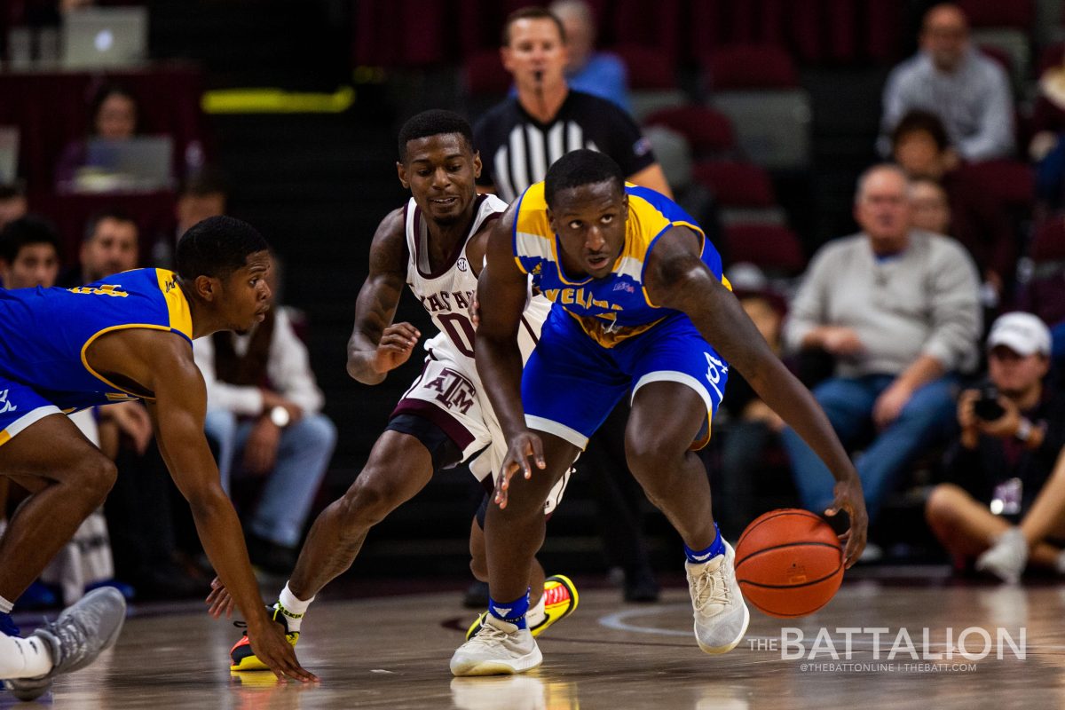 Junior guard Jay Jay Chandler defends against Texas A&M-Kingsville.