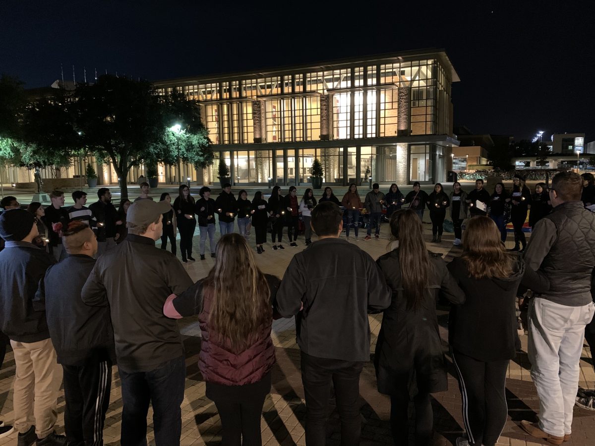 Students+gathered+at+Rudder+Plaza+at+7+p.m.+on+Nov.+1+to+recognize+lives+lost+in+crossing+the+US-Mexican+border.