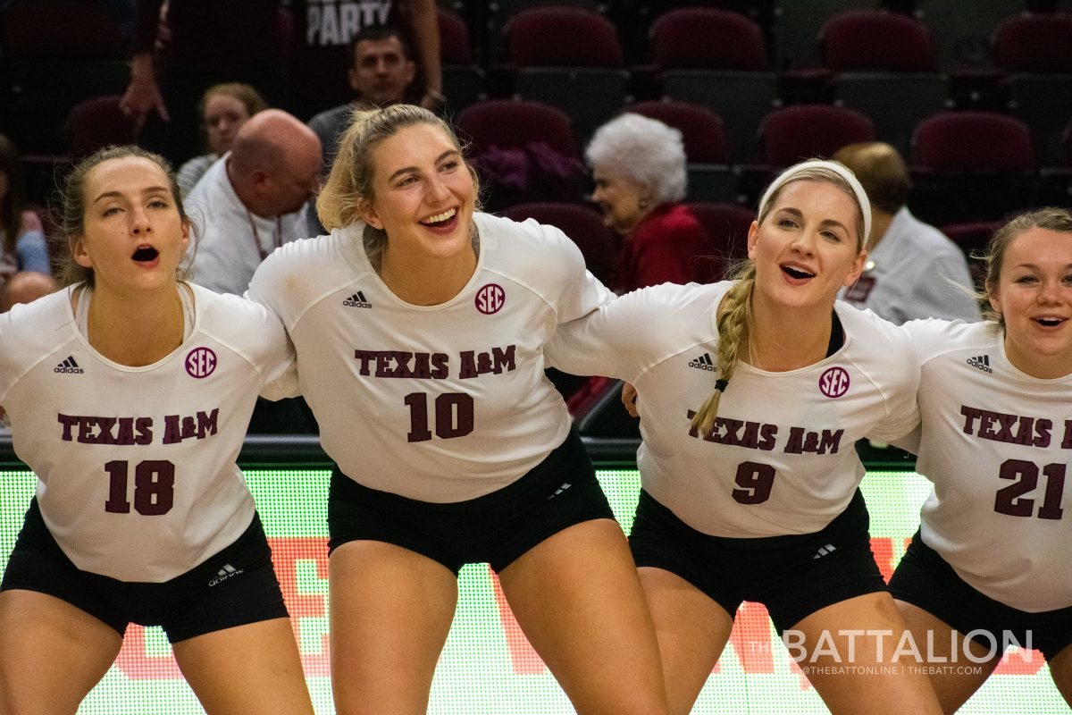 The+Aggies+celebrate+the+win+by+sawing+it+off+during+The+Aggie+War+Hymn.