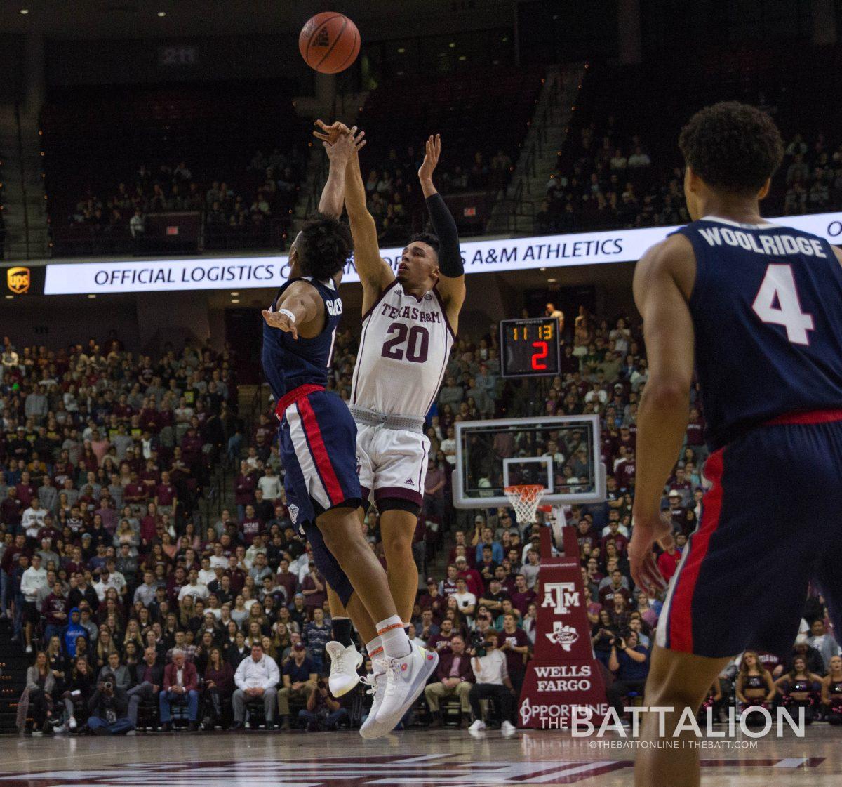 Andre Gordon attempts to make a three-point shot.