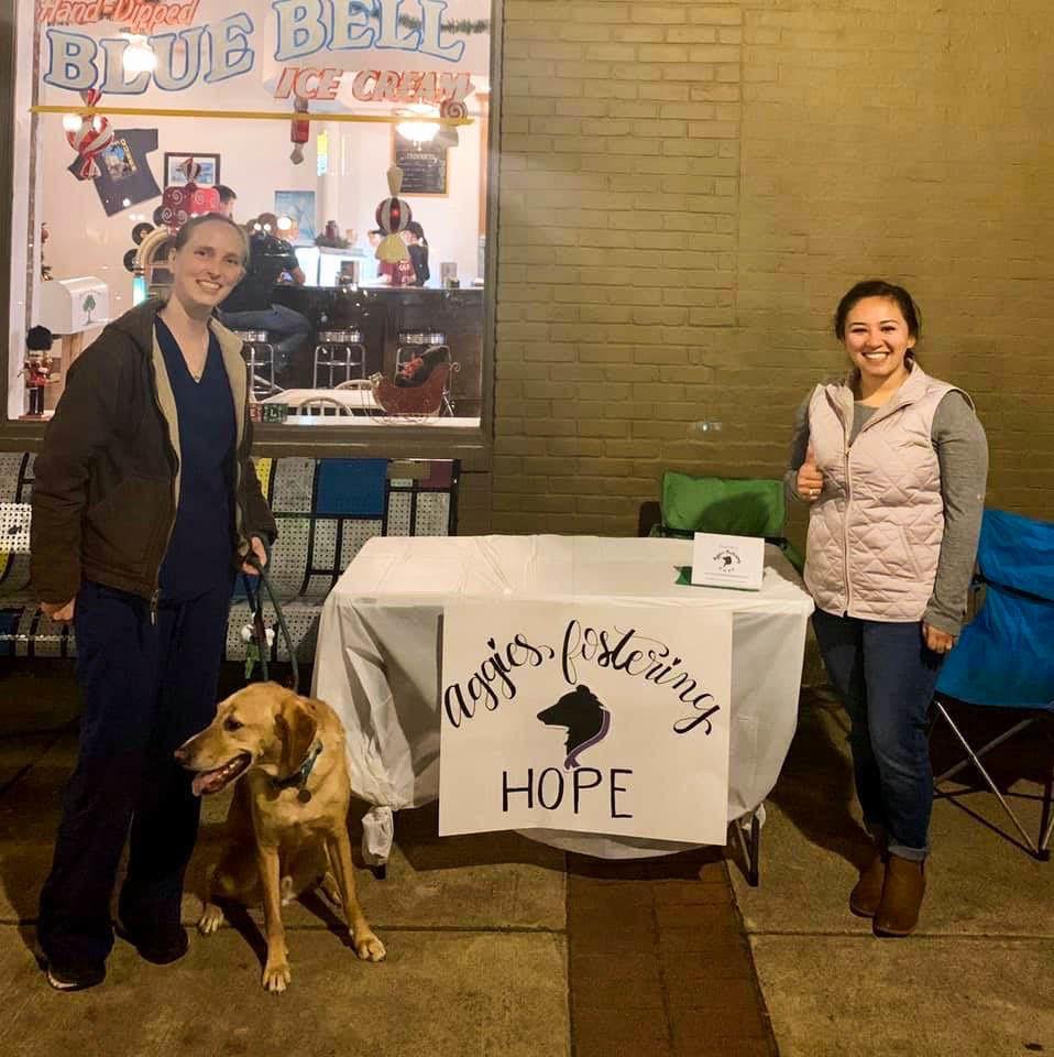 Third-year+veterinary+science+students+Jamie+Foster+and+Alyssa+Felton+raise+awareness+for+Aggies+Fostering+Hope+during+First+Friday.