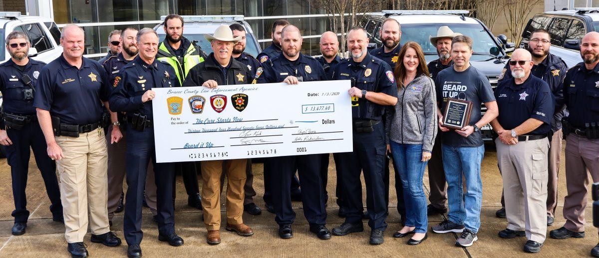 Members of Brazos Valley law enforcement agencies including the Brazos County Sherriffs Office, Bryan Police Department, College Station Police Department and Texas A&M University Police Department raised over $13,000 for cancer research.
