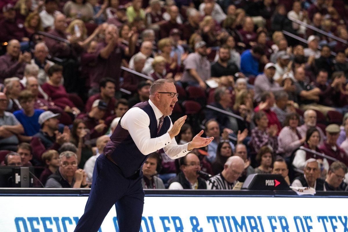 Head coach Buzz Williams cheers on his players from the sidelines. 