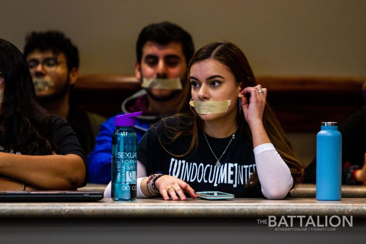 Silent protesters sat in on the student senate meeting while senators debated passage of the support of Texas A&M undocumented community resolution.