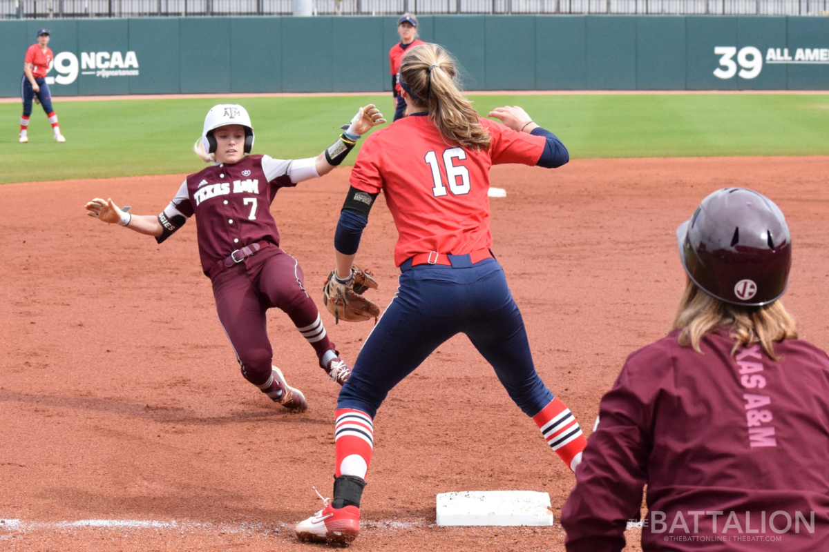 Senior Kelbi Fortenberry slides into third after hitting a triple.&#160; She would eventually score later that inning.