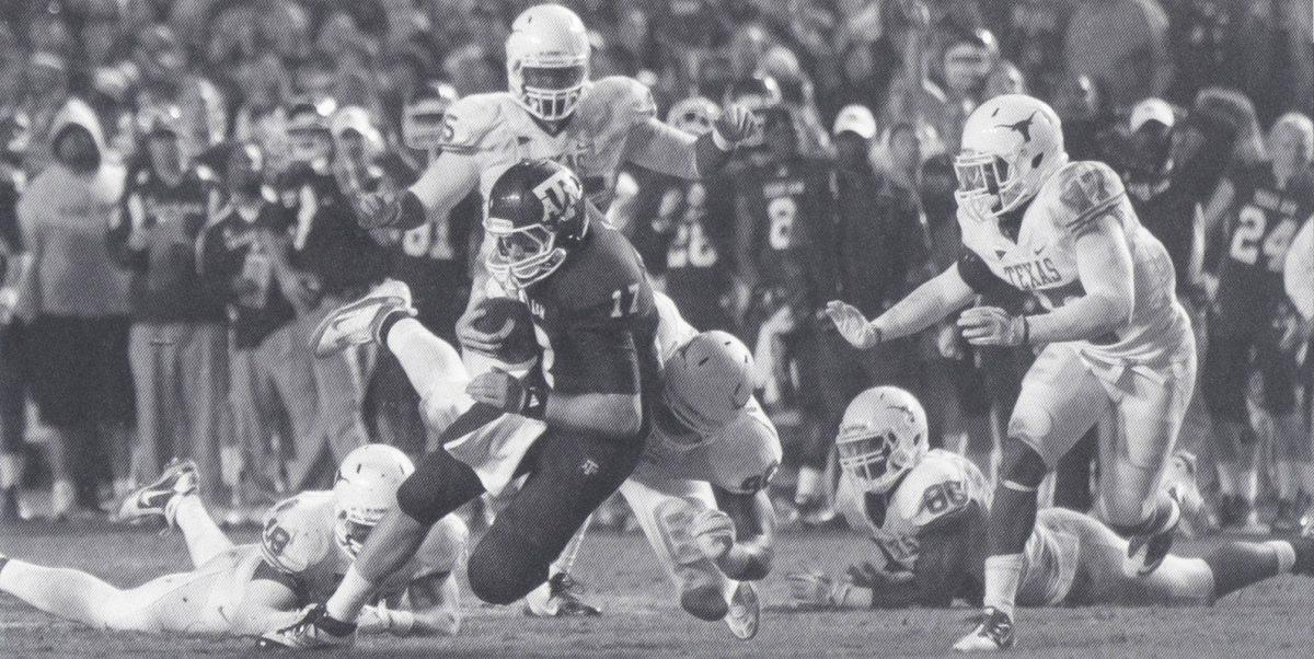 Quarterback Ryan Tannehill is brought down by a swarm of Longhorns during the last matchup between Texas A&amp;M and Texas in 2011.&#160;