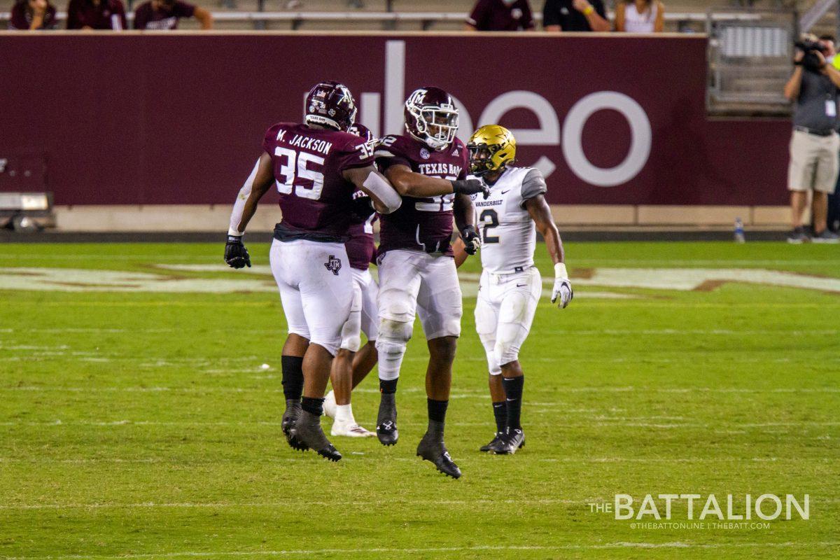 The Aggie defense celebrates a stop against Vanderbil.