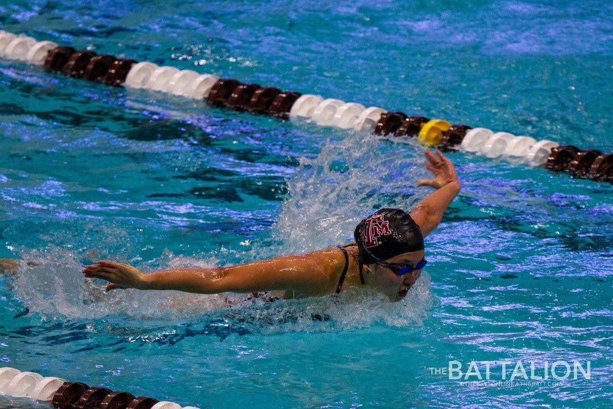 Senior swimmer Jing Wen Quah competes in the Butterfly for the Aggies.