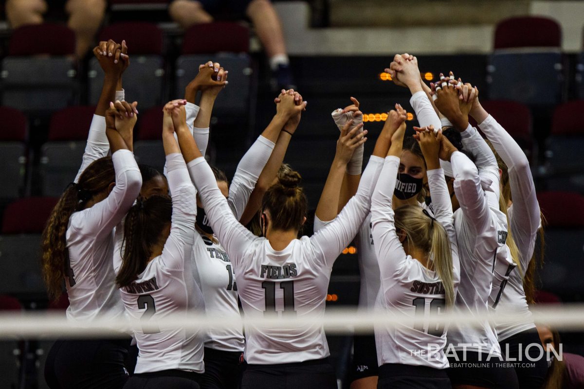 The Aggies huddle before the beginning of the match.
