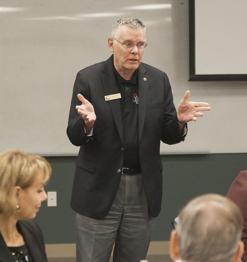 John Nichols speaks at an event thanking citizen committee volunteers in 2016.