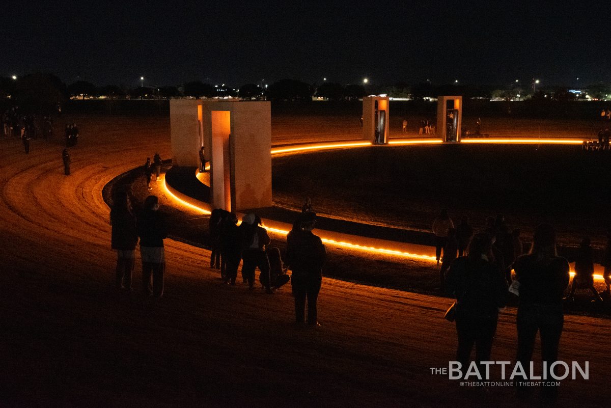 Nearly an hour before the ceremony, Aggies begin to gather around the Spirit Ring to honor the fallen.