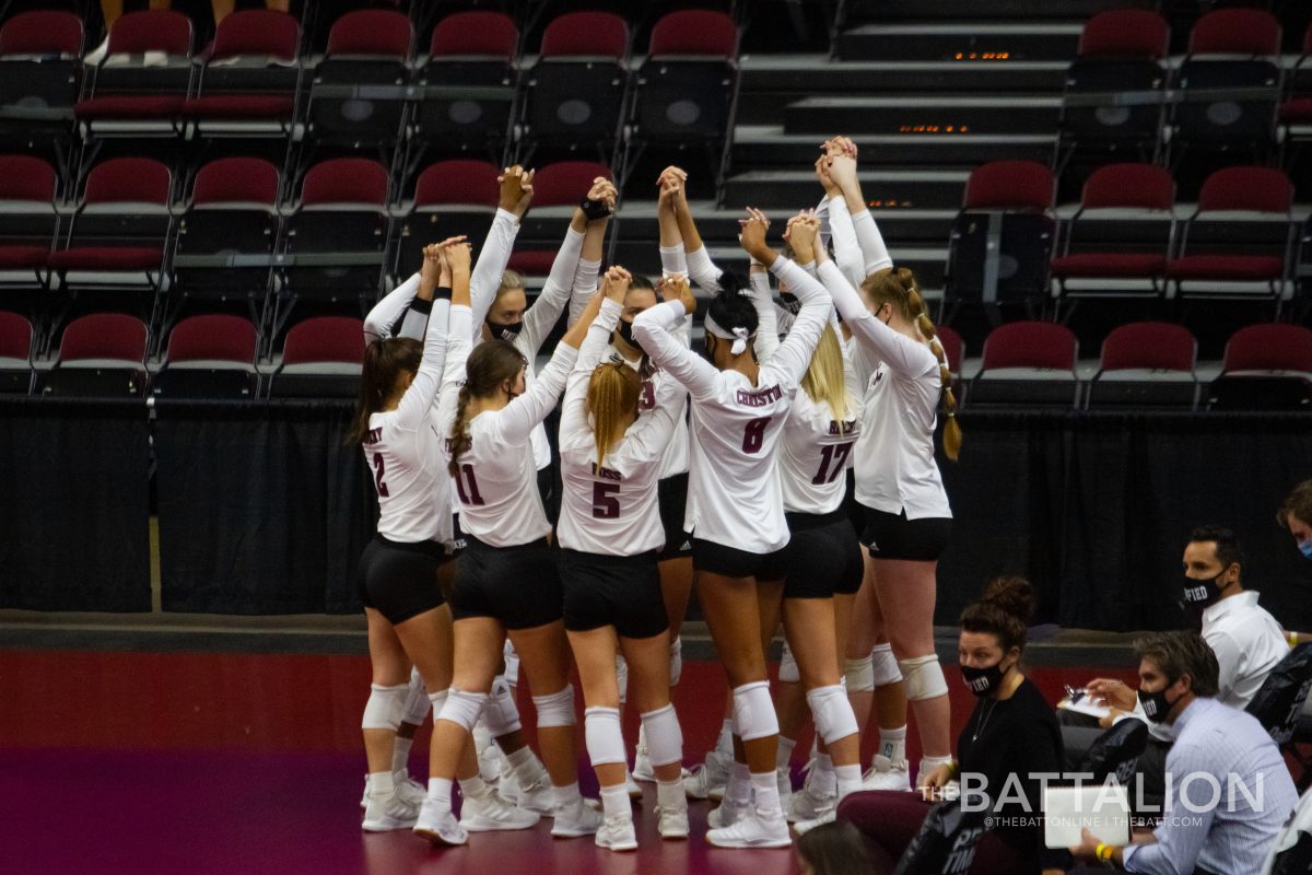 The team huddles before the game starts.