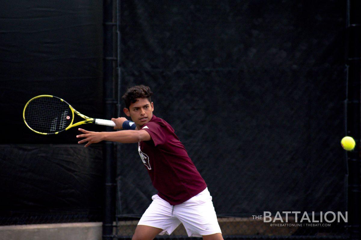 Senior Carlos Aguilar closed out A&Ms match against Pepperdine with a 6-2, 7-5 win over Guy Den Ouden.