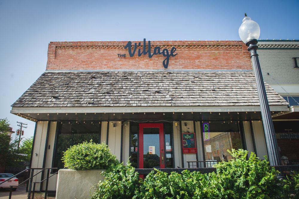The Village Cafe in Downtown Bryan has provided the Brazos Valley community with local food, art and brews since 2008. 