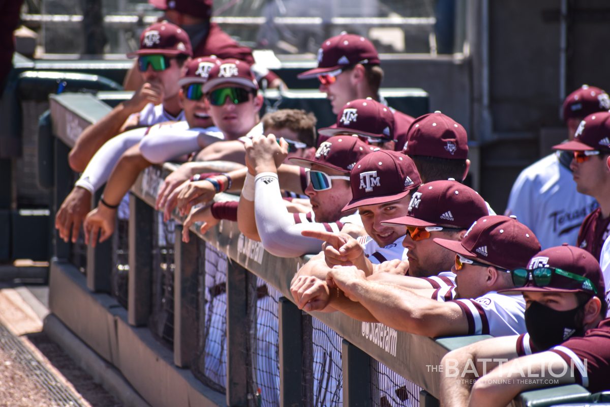The Texas A&M baseball teams lines the dugout before game three in the weekend series against Alabama. 