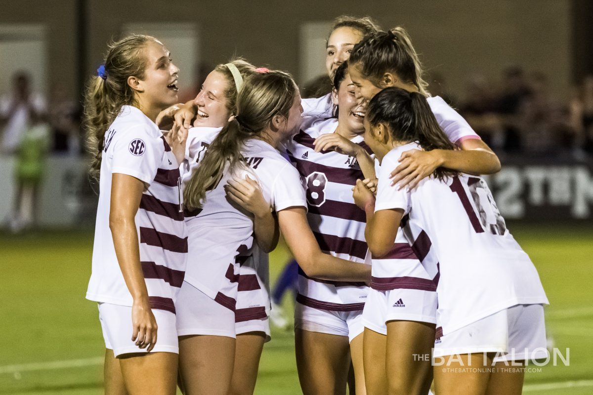 The Texas A&M soccer team celebrates after scoring the second goal of the game. 