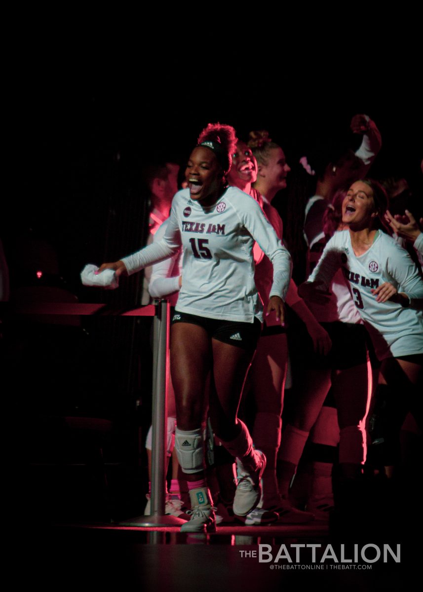 Senior middle blocker&#160;Madison Bower&#160;enters Reed Arena with a shirt to throw to the fans.&#160;