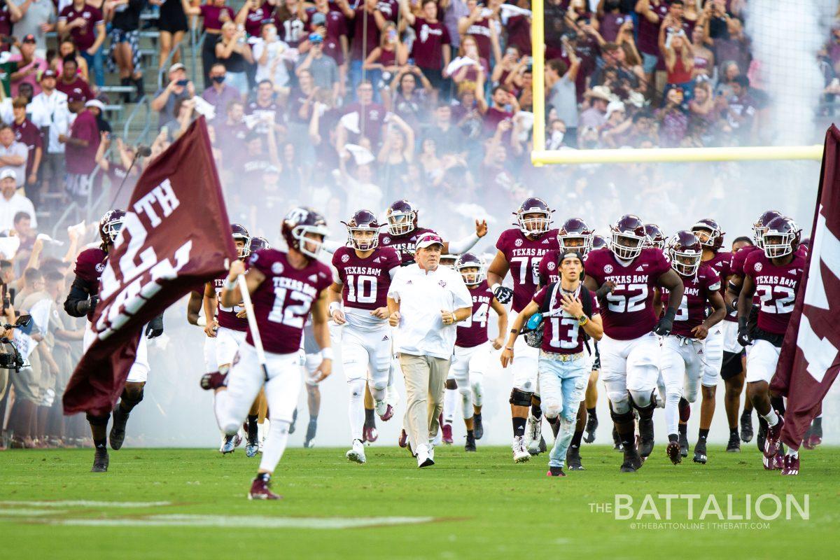 Jimbo Fisher and the Aggies taking the field before the game.