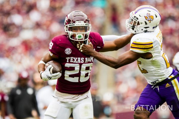 <p>Prairie View defense holding on, <strong>Isaiah Spiller </strong>tries his best to gain more yards. </p>