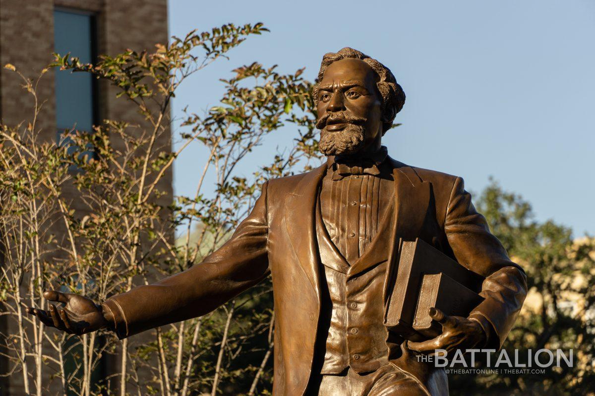 Students react to the Friday, Nov. 19 unveiling of the Matthew Gaines statue, an endeavor 27 years in the making. 