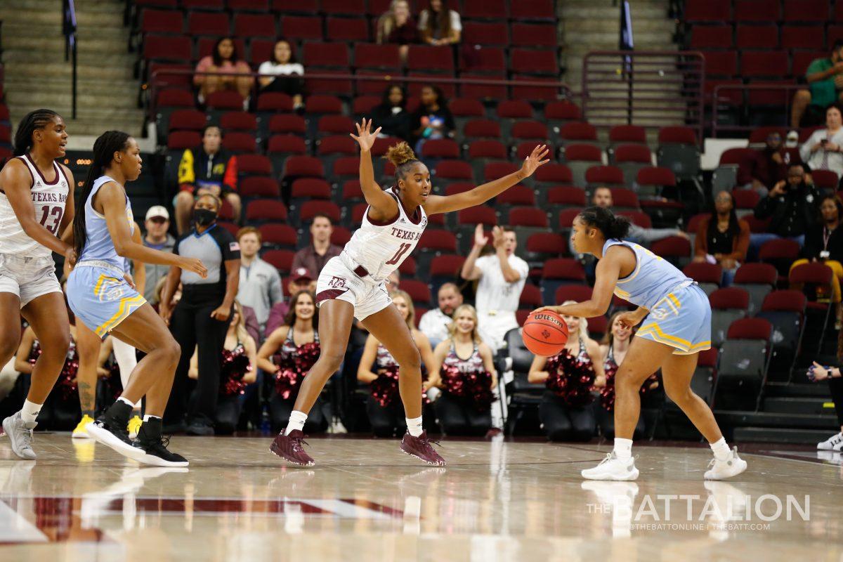 Graduate student and guard Kayla Wells was one of two Aggies to score a total of 15 points in the 65-50 victory over Little Rock. 