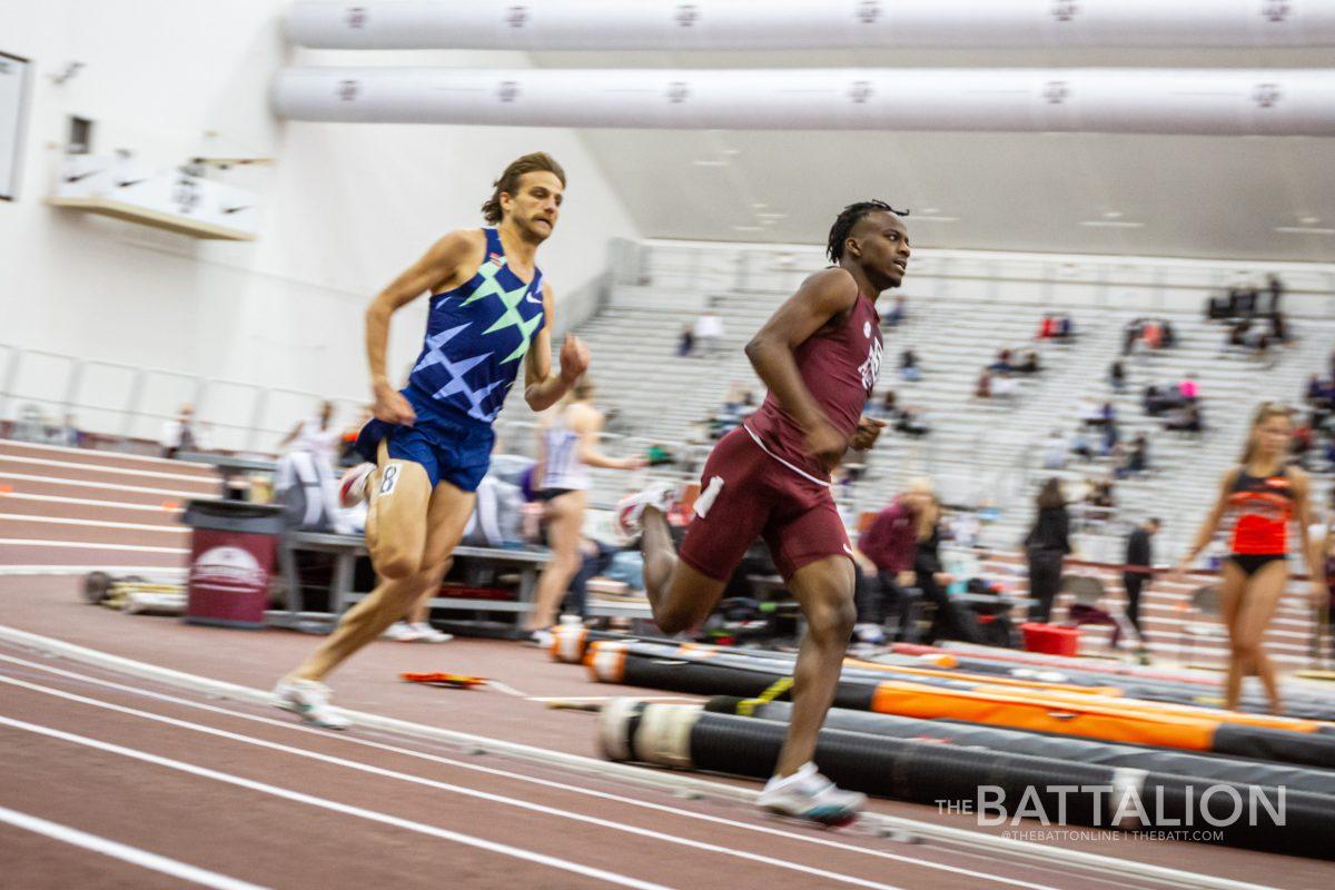 Track runner Brandon Miller runs at the Ted Nelson Invitational on Jan. 15, 2022.