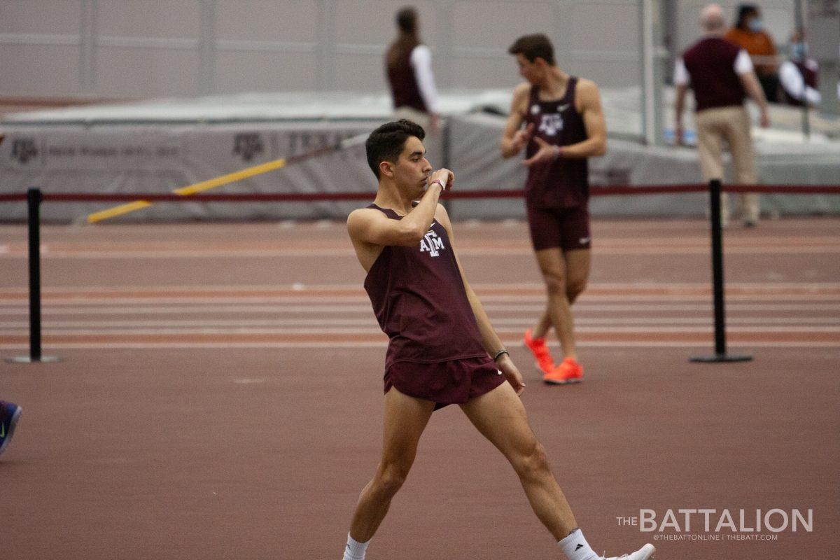 Mason Corbin, junior high jumper, prepares for his jump