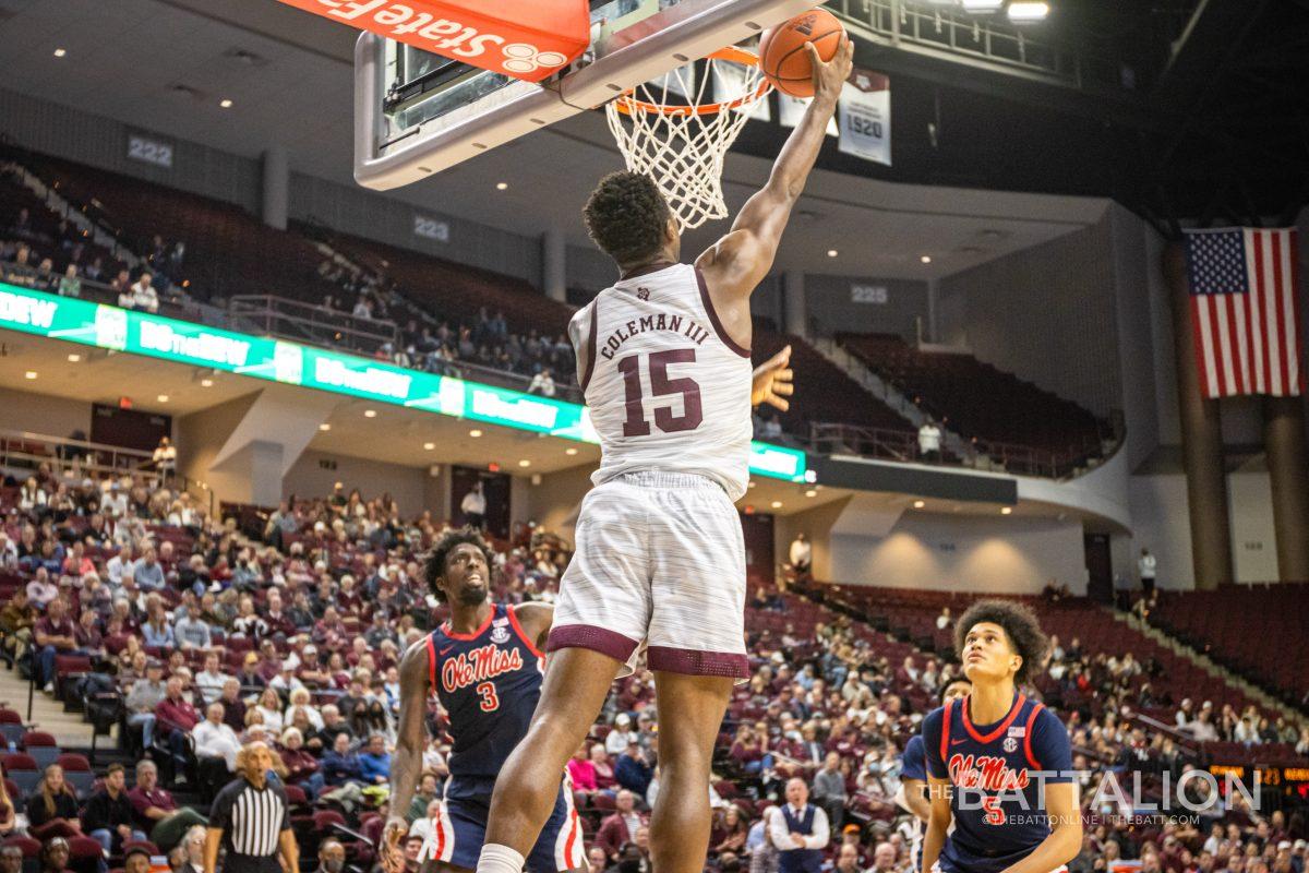 Sophomore forward Henry Coleman III (15) jumps to score on the Ole Miss Rebels in Reed Arena on Tuesday, Jan. 11, 2022.