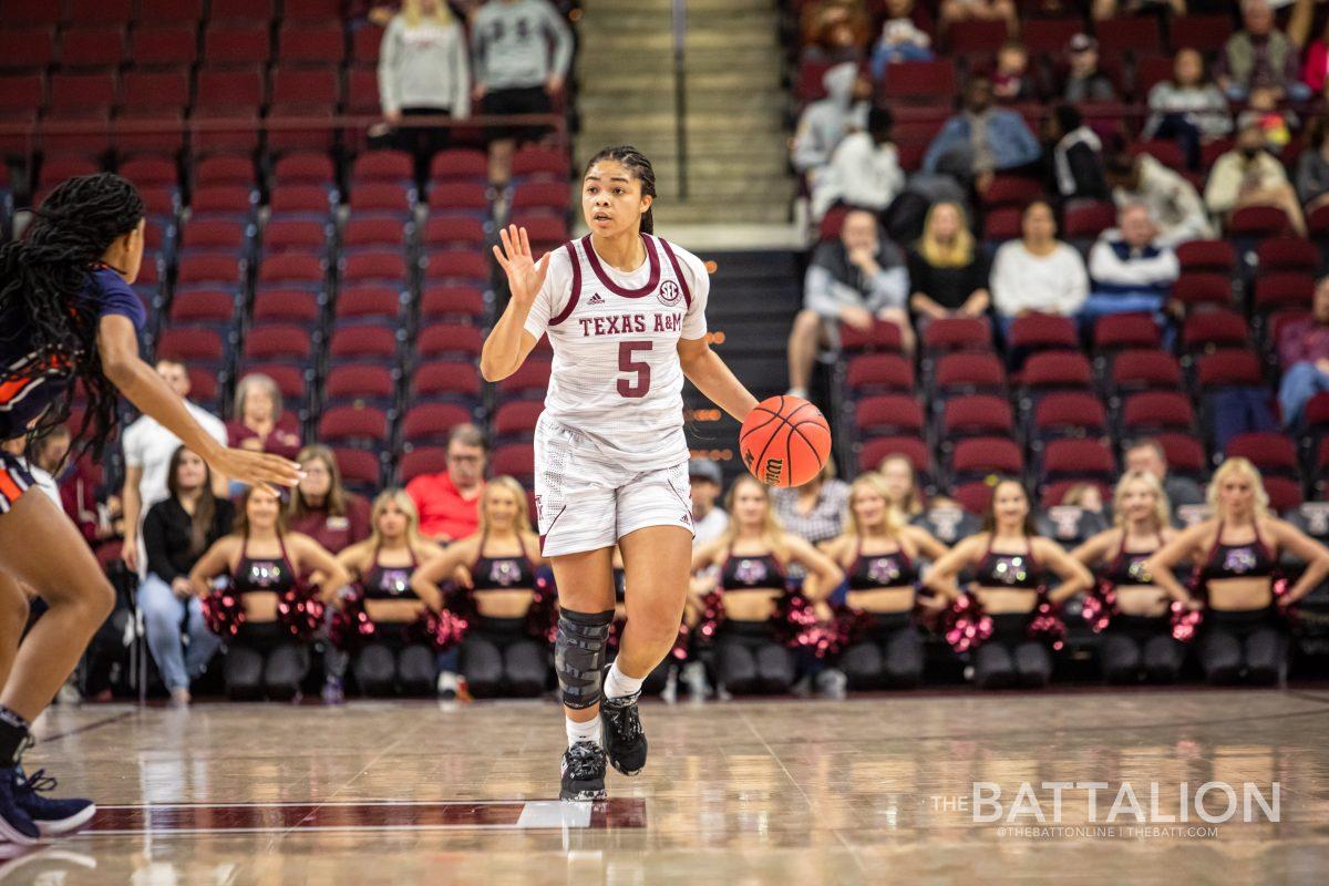 Redshirt junior Jordan Nixon (5) communicates with her teammates at midcourt during the Aggies' game against the Auburn Tigers in Reed Arena on Sunday, Jan. 16, 2022.