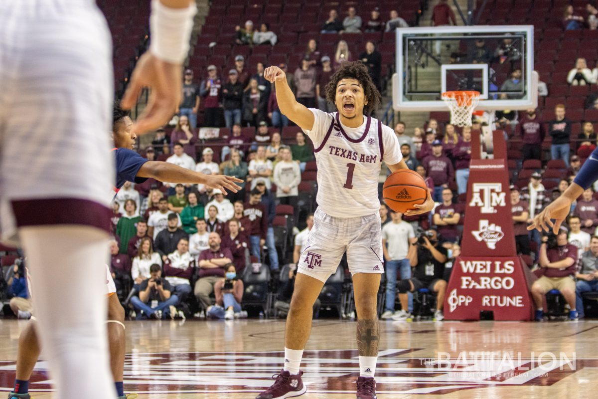 Sophomore guard Marcus Williams (1) coordinates with his teammates to score a basket early in the first half of Texas A&Ms game against Ole Miss on Tuesday, Jan. 11, 2022.