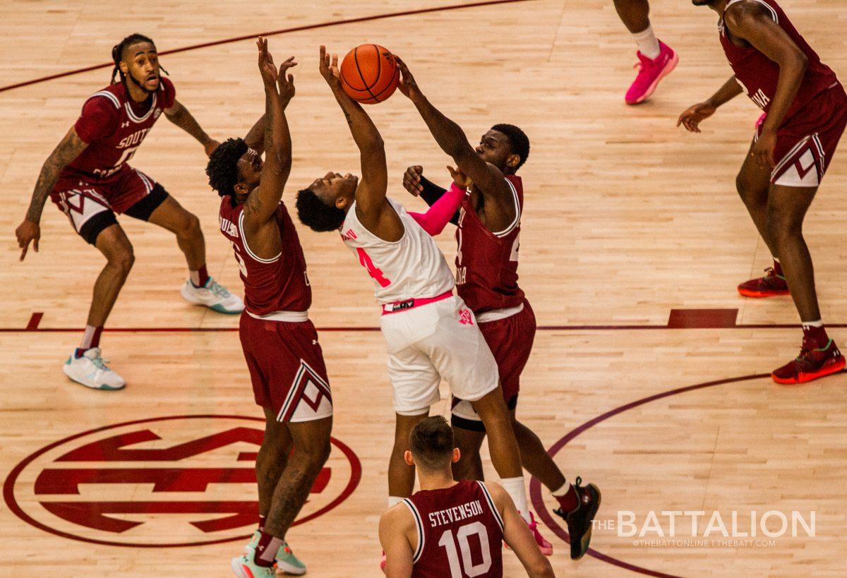 Freshman Wade Taylor IV blocks the Gamecocks from passing the ball.