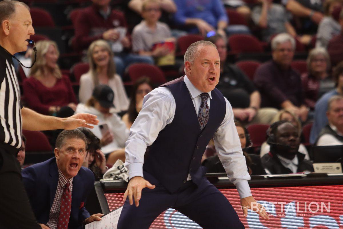 <p>Texas A&M coach Buzz Williams yells out to his players during the Aggies' game against the Gators on Tuesday, Feb. 15, 2022.</p>