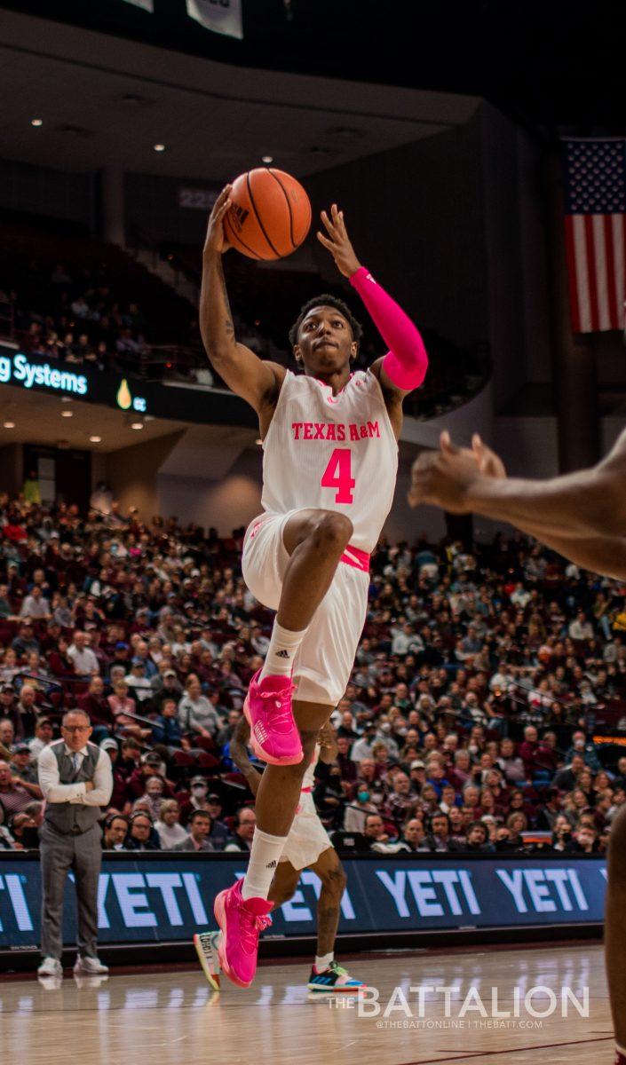 Freshman Wade Taylor makes a layup.