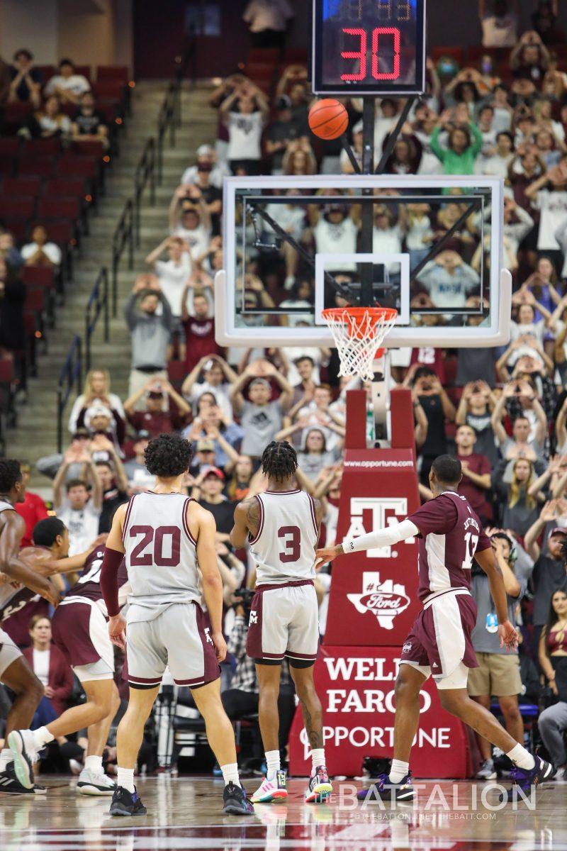 Fifth-year guard Quenton Jackson (3) shoots a free throw in Reed Arena on Saturday, Mar. 5, 2022.