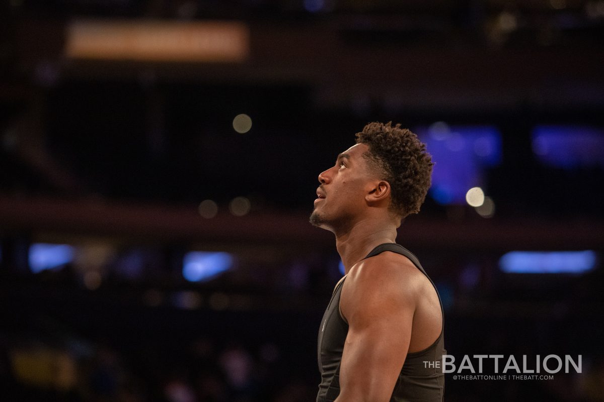 Sophomore forward Henry Coleman III (15) warms up before the start of the Aggies game against Washington State at Madison Square Garden on Tuesday, Mar. 29, 2022.