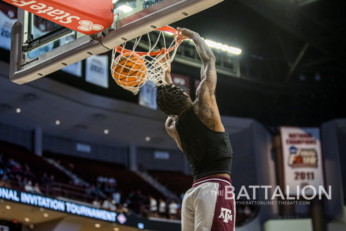 Graduate Quenton Jackson (3) warms up before the game on Wednesday, March 23 in Reed Arena
